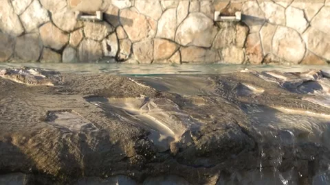 Luxury Pool Overflow Edge in Sunlit Hotel Garden, Portugal Stock Footage 326356350