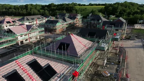 Luxury property development construction site aerial view during British 库存影片 337958128