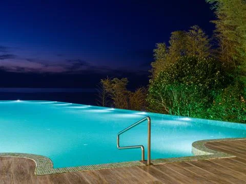 Luxury Resort Infinity Pool at Night Stock Photos