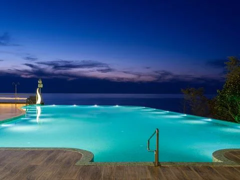 Luxury Resort Infinity Pool at Night Stock Photos