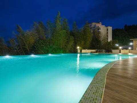 Luxury Resort Infinity Pool at Night Stock Photos