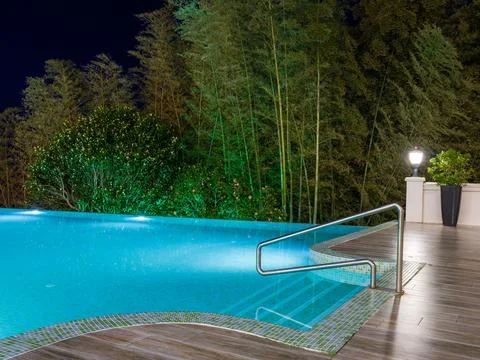 Luxury Resort Infinity Pool at Night Stock Photos