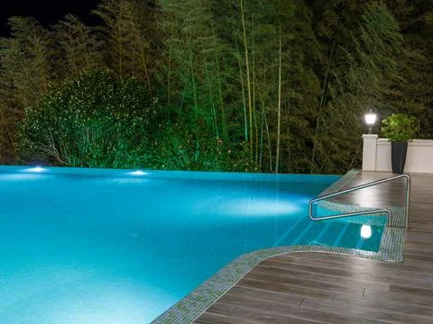 Luxury Resort Infinity Pool at Night Stock Photos