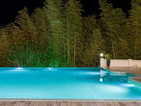 Luxury Resort Infinity Pool at Night Stock Photos