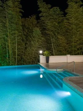 Luxury Resort Infinity Pool at Night Stock Photos