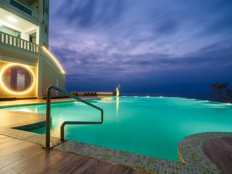Luxury Resort Infinity Pool at Night Stock Photos