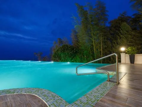 Luxury Resort Infinity Pool at Night Stock Photos