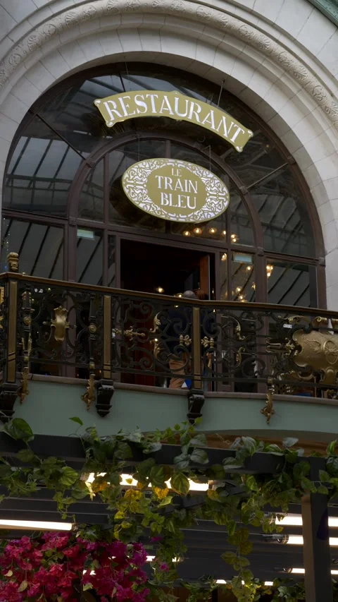Luxury restaurant facade in center of Paris. Le train Bleu. Vertical video Stock Footage 307304539