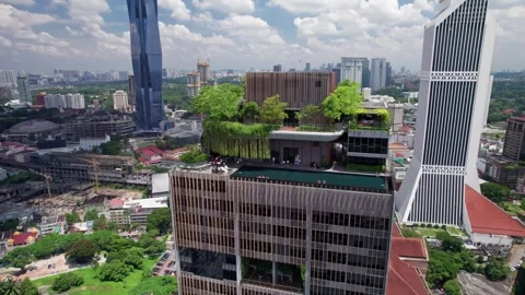 Luxury Rooftop Pool and Green Architecture With Merdeka 118 Skyline Stock Footage 345513184