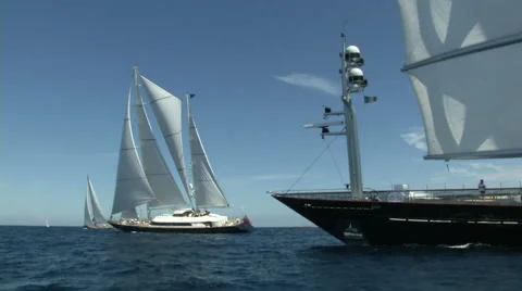 Luxury sailing yachts navigating  Stock Footage 43320389