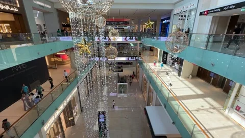 Luxury shops inside Dubai Mall with Christmas decoration and lighting Stock Footage 256888829