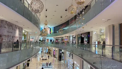 Luxury shops inside Dubai Mall with Christmas decoration and lighting Stock Footage 256888831