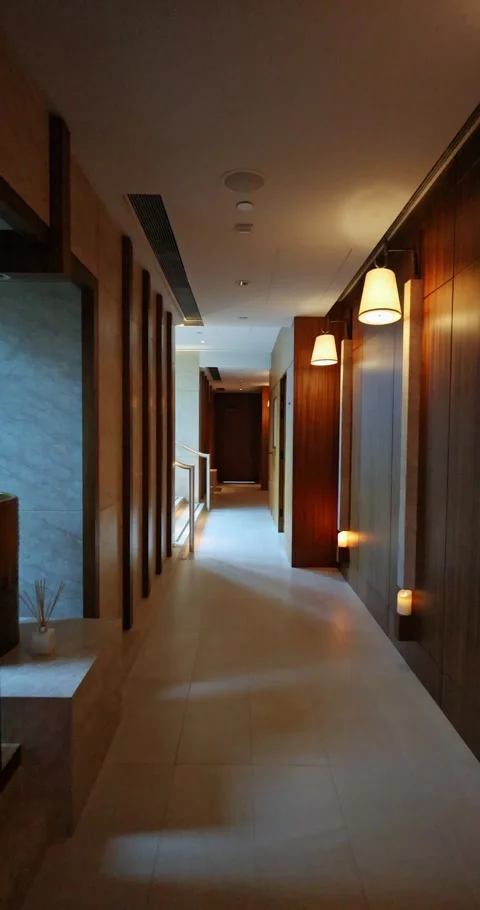 Luxury Spa Corridor with Warm Lighting in Modern Hotel Interior Видео 328003554