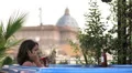 luxury spa - woman on the cell phone in jacuzzi - view of saint peter - wine HD Footage