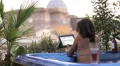 luxury spa - woman surfing in internet on tablet in whirlpool bath - jacuzzi HD Footage