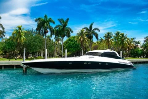Luxury speed yacht near tropical island in Miami, Florida Stock Photos