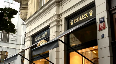 Luxury store exterior with people Rolex watch