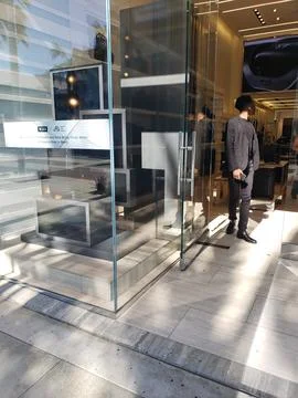 Luxury storefronts and high-end cars on Rodeo Drive, Beverly Hills, March 2019 Stock Photos