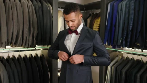 In a luxury suit shop client Afro Stock Video Pond5