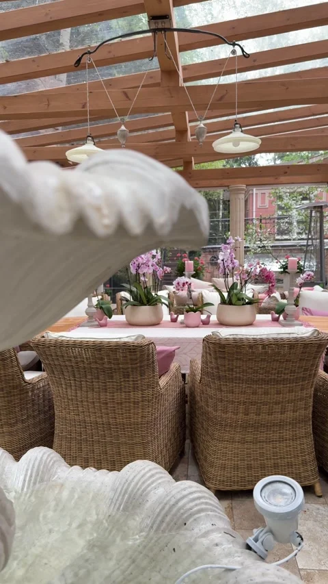 Luxury Summer Gazebo Interior with Decorative Fountain and Orchid Styling Stock Footage 334887974
