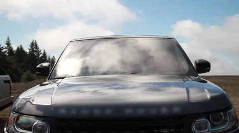 Luxury SUV-cloud reflection timelapse Stock Footage 55268275