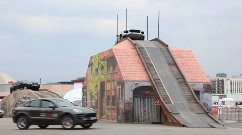 Luxury SUVs driving at an offroad parcour Stock Footage 55045341