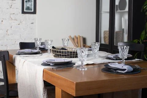 Luxury table setting for dining in dark colors Stock Photos