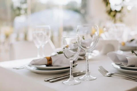 Luxury table setting for dining in pastel colors in restaurant Stock Photos