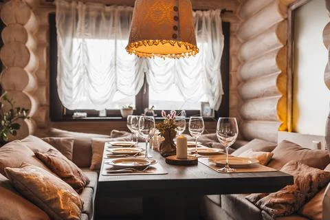 Luxury table setting for dining in a restaurant in pastel colors close up. We Stock Photos