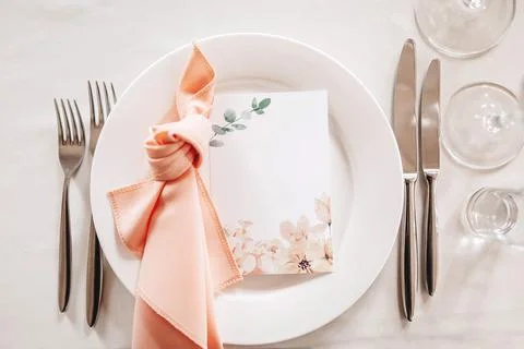 Luxury table setting for dining in a restaurant in pastel colors close up. We Foto stock