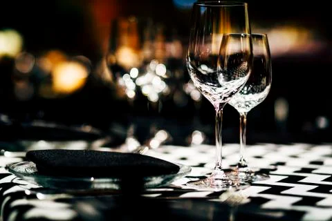 Luxury table settings for fine dining with and glassware, beautiful blurred   Stock Photos