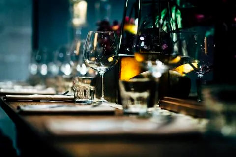 Luxury table settings for fine dining with and glassware, beautiful blurred   Stockfoto's