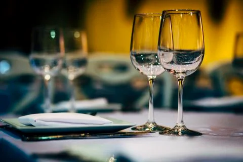 Luxury table settings for fine dining with and glassware, beautiful blurred   Stockfoto's
