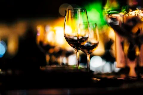 Luxury table settings for fine dining with and glassware, beautiful blurred   Stock Photos
