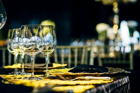 Luxury table settings for fine dining with and glassware, beautiful blurred   Stock Photos