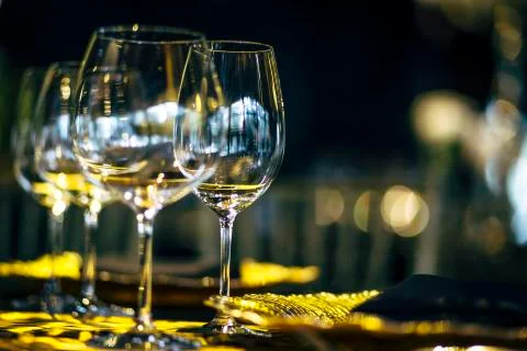 Luxury table settings for fine dining with and glassware, beautiful blurred   Stock Photos