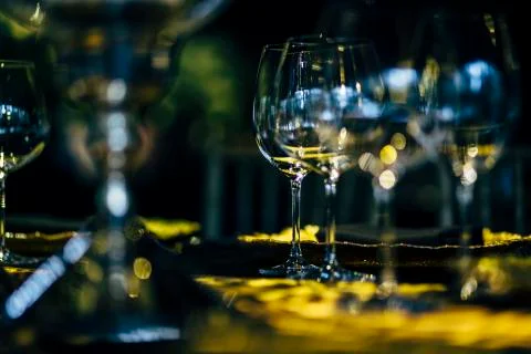 Luxury table settings for fine dining with and glassware, beautiful blurred   Stock Photos