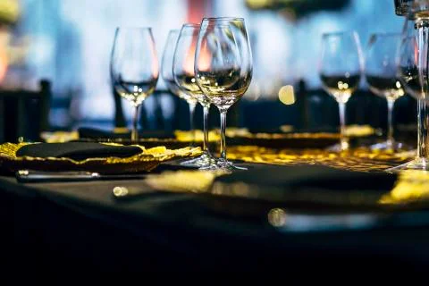 Luxury table settings for fine dining with and glassware, beautiful blurred   Stockfoto's