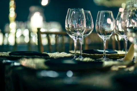 Luxury table settings for fine dining with and glassware, beautiful blurred   Stockfoto's
