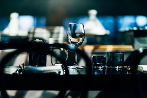 Luxury table settings for fine dining with and glassware, beautiful blurred   Stockfoto's
