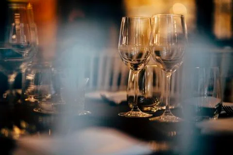 Luxury table settings for fine dining with and glassware, beautiful blurred   Stock Photos