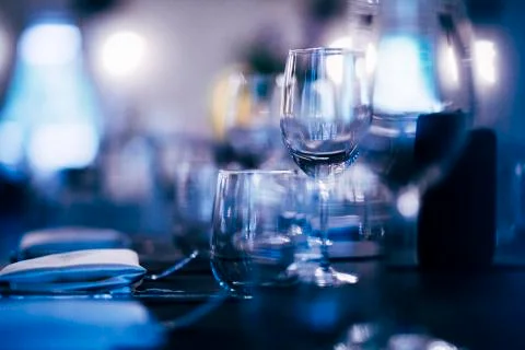 Luxury table settings for fine dining with and glassware, beautiful blurred   Stock Photos
