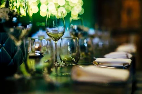 Luxury table settings for fine dining with and glassware, beautiful blurred   Stockfoto's