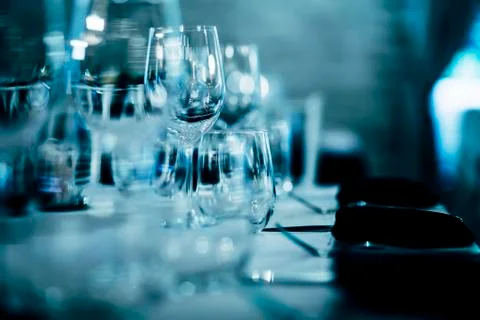 Luxury table settings for fine dining with and glassware, beautiful blurred   Stock Photos