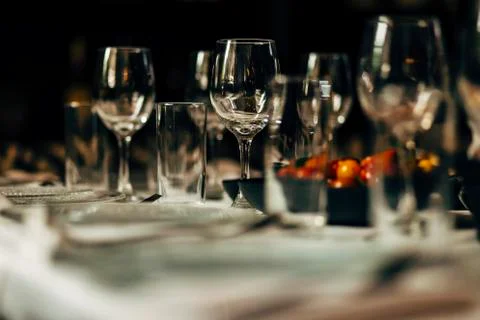 Luxury table settings for fine dining with and glassware, beautiful blurred   Stockfoto's