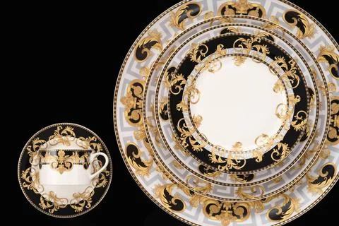 A luxury tableware set isolated on black background A luxury tableware set... Stock Photos