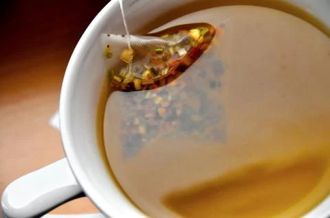 Luxury tea bag in cup Stock Photos