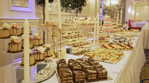 Luxury Wedding Dessert Buffet with Macaron Tower and Pastry Selection Stock Footage 327774122