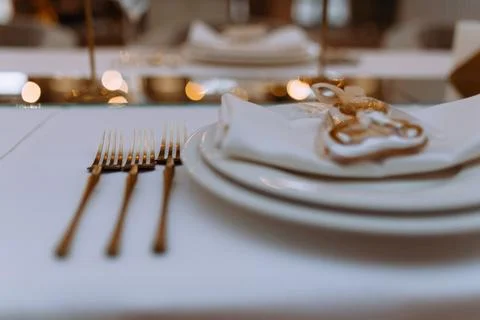 Luxury wedding reception dinner table with gold geometric decorations on ta.. Stock Photos
