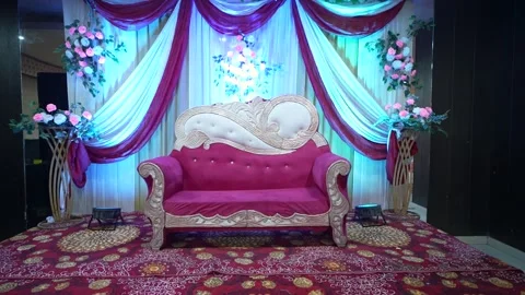 Luxury Wedding Stage with Pink Sofa and Floral Backdrop Stock Footage 341945811
